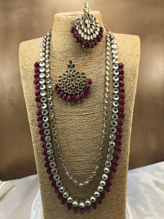 Kundun maroon long Mala with earring.