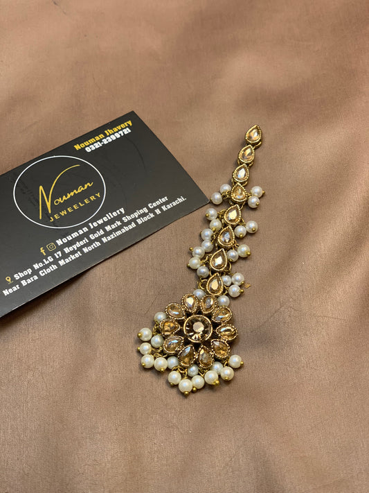 Champagne Pearls Kundun Tikka Collection,with small, medium, heavy, and large tikka designs.