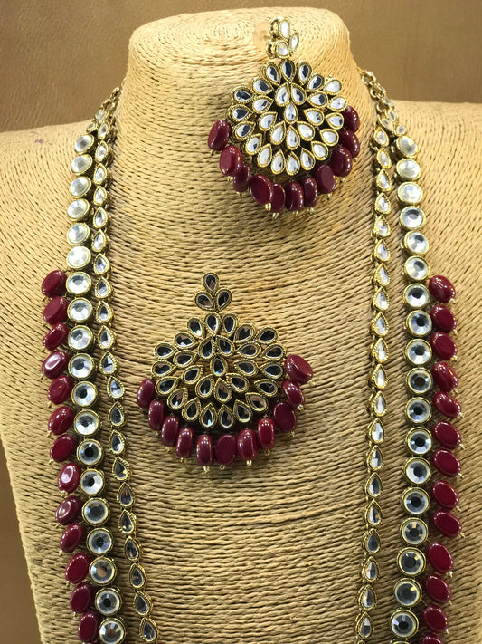 Kundun maroon long Mala with earring.